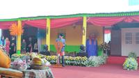 Penjabat (Pj) Gubernur DKI Jakarta Heru Budi Hartono di lokasi Lebaran Betawi 2023 di kawasan Monumen Nasional (Monas), Jalan Medan Merdeka, Gambir, Jakarta Pusat, Minggu (8/5/2023) pagi. (Liputan6.com/Winda Nelfira)