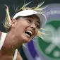 Ekspresi petenis Rusia, Maria Sharapova, saat berlaga melawan Timea Bacsinszky (Swiss) di pertandingan tenis tunggal putri Wimbledon, London, (26/6/2014). (REUTERS/Toby Melville)