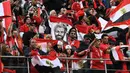 Suporter Mesir memberikan dukungan saat akan menonton laga Grup A Piala Dunia melawan Uruguay di Stadion Ekaterinburg, Yekaterinburg, Jumat (15/6/2018). Terakhir kali Mesir lolos ke Piala Dunia tahun 1990. (AFP/Anne-Chritine Poujoulat)