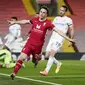 Pemain Liverpool, Diogo Jota, melakukan selebrasi usai mencetak gol ke gawang Leicester City pada laga Liga Inggris di Stadion Anfield, Senin (23/11/2020). Liverpool menang dengan skor 3-0. (AP Photo/Jon Super)