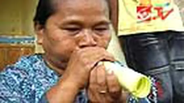 Bertahun Baru dengan Terompet Tradisional