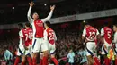 Raihan tiga poin penting bagi Arsenal untuk terus mengejar Liverpool di puncak klasemen sementara Liga Inggris 2024/2025. Sementara, Manchester United masih tertahan di peringkat ke-11 dengan 19 poin dari 14 laga. (Adrian Dennis/AFP)