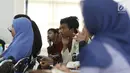 Mahasiswa dar berbagai kampus saat mengikuti Workshop Session Emtek Goes to Campus 2018 di Gedung 2 Universitas Padjajdaran, Bandung, Selasa (4/12). Sesi workshop diisi sejumlah materi termasuk jurnalistik media on line. (Liputan6.com/Helmi Fithriansyah)