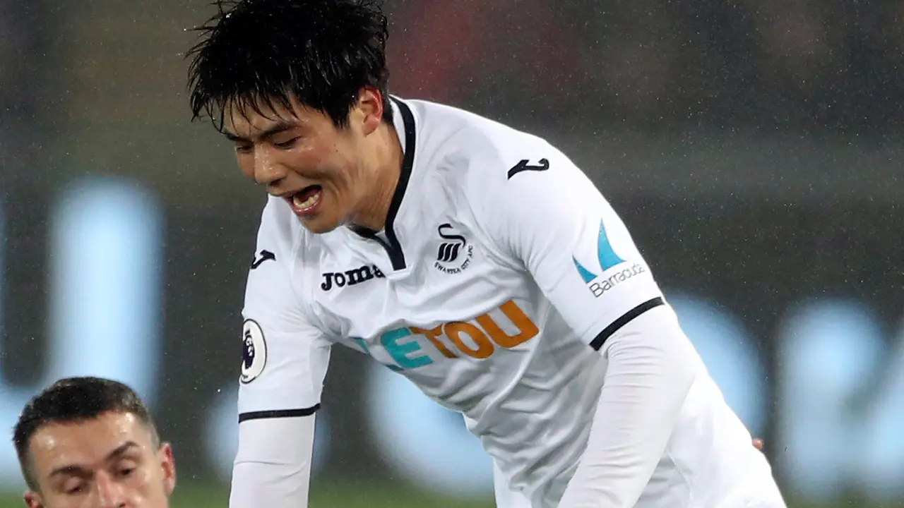 Arsenal Digulung Swansea City