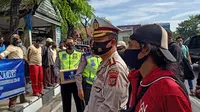 Rayakan Hari Lalu Lintas Bhayangkara, Ditlantas Polda Sulsel Bagikan Masker dan Sembako