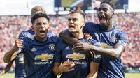 Gelandang Manchester United, Andreas Pereira, melakukan selebrasi usai mencetak gol ke gawang Liverpool pada laga ICC 2018 di Stadion Ann Arbor, Michigan, Minggu (29/7/2018). Liverpool menang 4-1 atas Manchester United. (AP/Tony Ding)