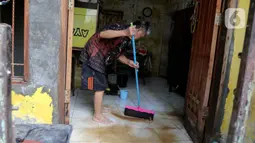 Badan Penanggulangan Bencana Daerah (BPBD) Provinsi Daerah Khusus Jakarta mencatat hingga pukul 11.00 WIB banjir yang menggenangi 77 wilayah Rukun Tetangga sejak Minggu (2/3) malam lalu telah surut. (Liputan6.com/Herman Zakharia)