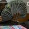 Petugas valas menghitung mata uang dolar AS di DolarAsia Valas di kawasan BSD, Tangerang Selatan, Banten, Selasa (16/4/2024). (merdeka.com/Arie Basuki)