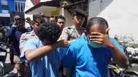 2 Tersangka Diksar Mapala UII Tertunduk Malu Saat Diperiksa Polisi (Liputan6.com/Reza Efendi).