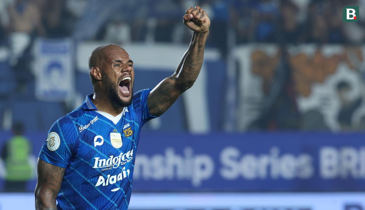 <p>Pemain Persib Bandung, David Da Silva melakukan selebrasi setelah mencetak gol ke gawang Madura United pada laga leg 1 final Championship Series BRI Liga 1 2023/2024 antara Persib Bandung melawan Madura United di Stadion Si Jalak Harupat, Bandung, Minggu (26/05/2024). (Bola.com/M Iqbal Ichsan)</p>