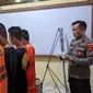 Empat tersangka pemalsu dokumen SIM diamankan Satreskrim Polresta Bandar Lampung. Foto : (Liputan6.com/Ardi)