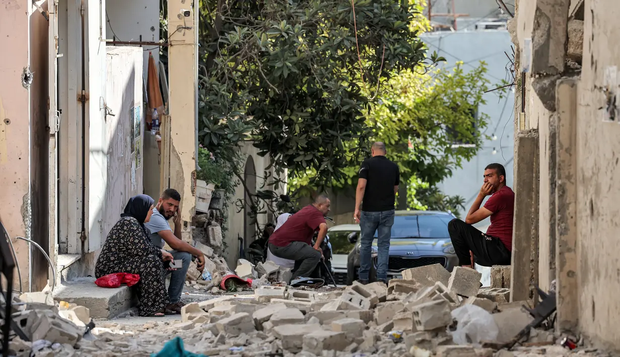 Dalam operasi militer Israel diwarnai serangan drone dan pengerahan ratusan tentara Israel di Jenin. (AFP/Ahmad Gharabli)