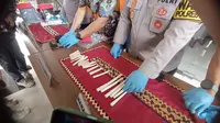 Pipa rokok berbahan gading gajah yang disita oleh Satreskrim Polresta Bandar Lampung. Foto : (Liputan6.com/Ardi).
