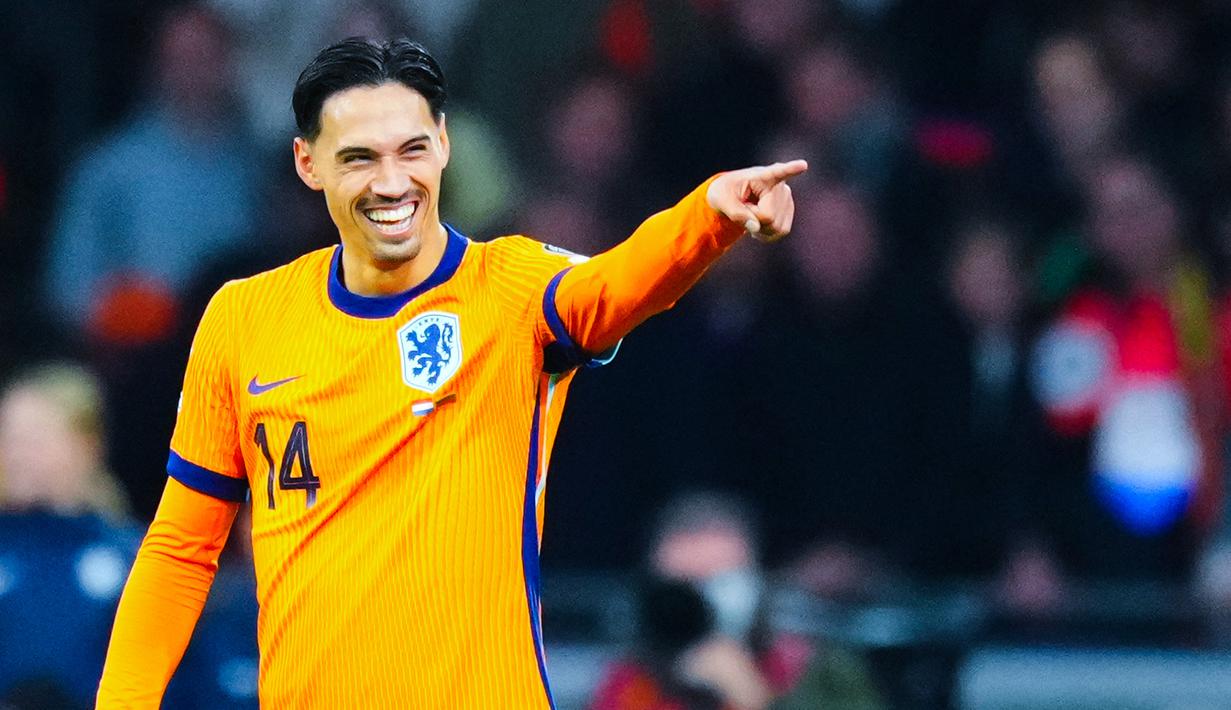 Pemain Timnas Belanda, Tijjani Reijnders, melakukan selebrasi setelah memcetak gol ke gawang Lituania pada laga terakhir Grup G kualifikasi zona Eropa di Stadion Johan Cruijff ArenA, Amsterdam, Senin (17/11/2025). (AP Photo/Peter Dejong)