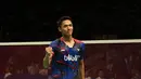 Senyum Jonatan Christie memberi usai menang atas Lin Dan pada laga Indonesia Open 2016 di Istora Senayan, Jakarta, Kamis (2/6/2016). (Bola.com/Nicklas Hanoatubun)