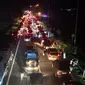 Kemacetan Panjang Menuju Pelabuhan Merak. (Sabtu, 06/04/2024). (Yandhi Deslatama/Liputan6.com).
