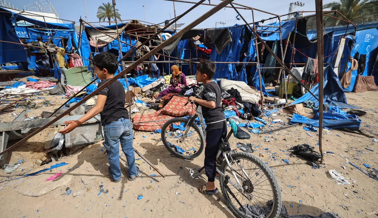 Sejak dimulainya blokade bantuan oleh Israel pada 2 Maret 2025, otoritas kesehatan Gaza melaporkan bahwa 57 anak meninggal akibat kekurangan gizi. Dan, jika situasi ini terus berlanjut, diperkirakan hampir 71.000 anak di bawah usia lima tahun akan mengalami kekurangan gizi akut dalam 11 bulan ke depan. (Eyad BABA/AFP)
