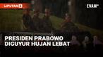 Presiden Prabowo Subianto memimpin Upacara Parade Senja di Akademi Militer Magelang, Jumat (25/10). Bersama Wapres Gibran Rakabuming dan sejumlah menteri, Prabowo melakukan pemeriksaan pasukan dengan menaiki mobil Maung atap terbuka di tengah hujan d...