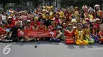 Dalam rangka memperingati Hari Sumpah Pemuda, Gerakan Nasional Orang Tua Asuh (GNOTA) gelar Festival Anak Asuh di Car Free Day, Jakarta, Minggu (1/11/2015). Festival ini diikuti 200 lebih anak asuh dari SDN Kebon Sirih. (Liputan6.com/Yoppy Renato)