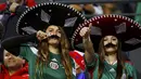 Pesona kecantikan wanita suporter Meksiko. (REUTERS/Ivan Alvarado)
