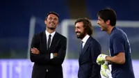 Paolo Maldini, Andrea Pirlo, Gianluigi Buffon (FILIPPO MONTEFORTE / AFP)