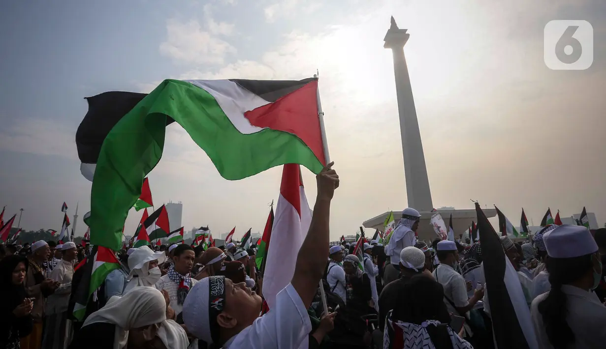 “Palestina merdeka! Palestina merdeka!” sorak peserta aksi. (Liputan6.com/Angga Yuniar)