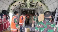 Hercules Milik TNI AU mengangkut logistik ke Pulau Galang. (Foto: dokumentasi TNI)