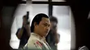 Ekspresi Riefan Avrian saat hakim menjatuhkan vonis kepada dirinya di Pengadilan Tipikor, Jakarta, Rabu (17/12/2014). (Liputan6.com/Miftahul Hayat)