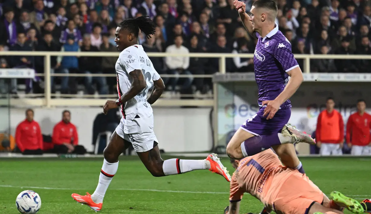 Kemenangan ini membuat AC Milan kokoh di peringkat dua klasemen sementara dengan poin 65. (Alberto PIZZOLI/AFP)
