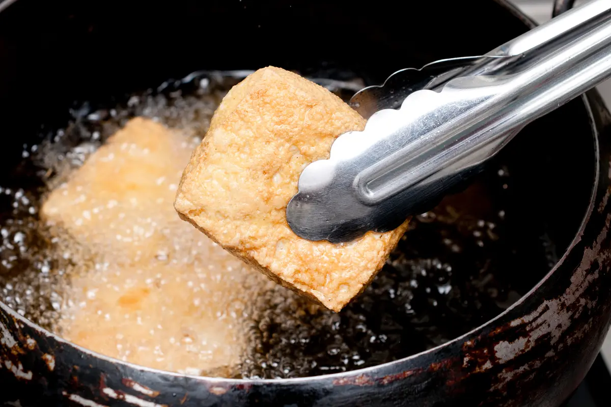 Menggoreng tahu