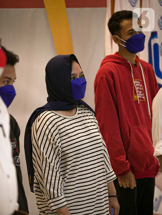 Calon Pekerja Migran Indonesia (CPMI) dihadirkan di Gedung BP2MI, Jakarta, Senin (15/3/2021). BP2MI telah melakukan sidak ke PT Mafan Samudra Jaya di Bogor, Jawa Barat. (Liputan6.com/Faizal Fanani)