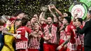 Meski seperti bermain di kandang sendiri, Olympiakos baru bisa memecah kebuntuan di akhir masa tambahan waktu pertandingan kedua. (Angelos Tzortzinis/AFP)