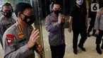 Calon Kapolri, Komjen Listyo Sigit Prabowo (kedua kiri) didampingi Kapolri Jenderal Idham Azis tiba di Gedung Nusantara II DPR, Senayan, Jakarta, Rabu (20/1/2021). Komjen Listyo menjalani uji kelayakan dan kepatutan (fit and proper test) calon Kapolri di Komisi III DPR. (Liputan6.com/Angga Yuniar)