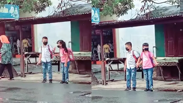 Potret romantis dua bocah menyebrang jalan.