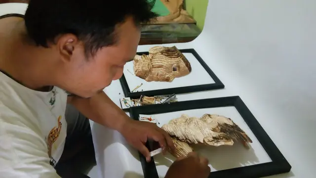 Wajah Jokowi dan Prabowo dalam Bentuk Ribuan Batang Korek Api