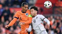 Keran gol awalnya dibuka oleh Xavi Simons (23’), kemudian dilanjutkan oleh Virgil van Dijk (49’), Donyell Malen (97’) dan ditutup oleh Wout Weghorst (90+3’). (JOHN THYS / AFP)