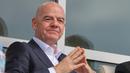 Momen itu juga disaksikan Presiden FIFA Gianni Infantino yang turut hadir di pertandingan Iran vs Kosta Rika. (AP Photo/Riza Ozel)