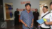 Anggota DPRD DKI Jakarta Abraham Lunggana (Haji Lulung) usai diperiksa penyidik Direktorat Tindak Pidana Korupsi Bareskrim Polri di Ombudsman, Jakarta, Rabu (12/4). (Liputan6.com/Helmi Afandi) 