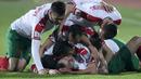 Striker Bulgaria, Spas Delev, merayakan gol yang dicetaknya ke gawang Belanda pada laga kualifikasi Piala Dunia 2018 di Stadion Vassil Levski, Bulgaria, Sabtu (25/3/2017). Bulgaria menang 2-0 atas Belanda. (AFP/Nikolay Doychinov)