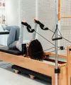 Seorang wanita sedang melakukan olahraga pilates. (dok. Unsplash/Ahmet Kurt)
