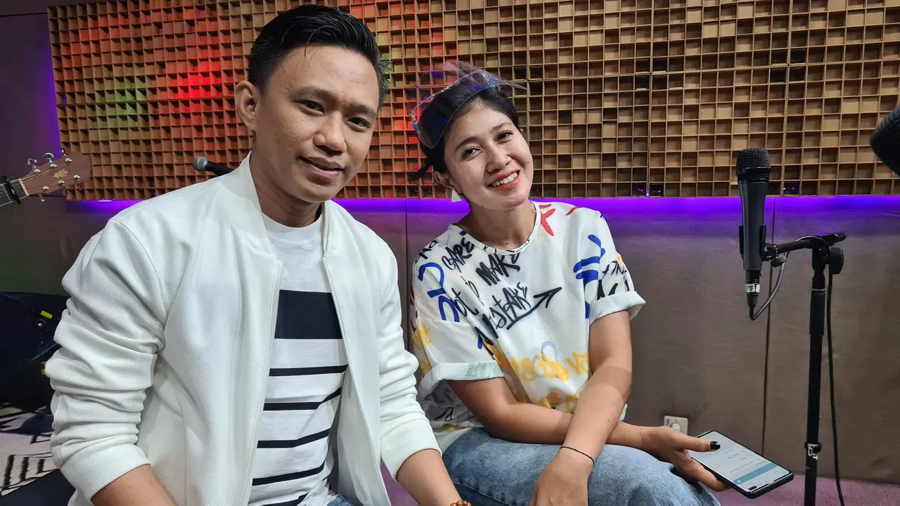 Erie Suzan dan Rommy Putra