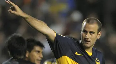 Penyerang Boca Juniors, Rodrigo Palacio merayakan golnya ke gawang Deportivo Tachira dalam pertandingan penyisihan Grup 2 Copa Libertadores di Stadion La Bombonera, Buenos Aires, 30 April 2009. AFP PHOTO/Juan Mabromata