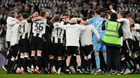 Newcastle United berhasil meraih kemenangan dramatis atas Liverpool dengan skor 2-1 pada final EFL Cup, sekaligus mengakhiri puasa gelar domestik selama 56 tahun di Stadion Wembley, Senin (17/3/2025) dini hari WIB. (AFP/Glyn Kirk)