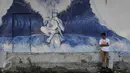 Karya yang dipamerkan pada Pameran Jakarta Biennale fokus pada permasalahan ekonomi, sosial, lingkungan dan dinamika masyarakat saat ini, Jakarta, Sabtu (14/11/2015). Pameran ini diikuti seniman dari dalam dan luar negeri. (Liputan6.com/ Gempur M Surya)