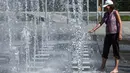 "Beberapa rekor mungkin dipecahkan, terutama pada hari Selasa di lembah Rhone dengan perkiraan suhu 40-42C," kata layanan cuaca nasional Meteo France. (AFP/Sebastien Bozon)