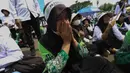 Para guru madrasah swasta dari berbagai daerah di Indonesia saat melakukan aksi unjuk rasa di depan Gedung MPR/DPR/DPD RI, Jakarta, Rabu (11/2/2026). (Kapanlagi.com/Budy Santoso)
