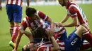 Para pemain Atletico Madrid merayakan gol yang diciptakan Diego Godin di Estadio da Luz, Lisbon, Portugal, Minggu (25/5/2014) dinihari WIB (AFP PHOTO/FRANCK FIFE)