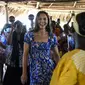 Kate Middleton menari dengan perempuan Garifuna di Hopkins Village, Belize pada 20 Maret 2022. (Johan ORDONEZ / AFP)