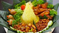 Ilustrasi tumpeng nasi kuning. Foto: opiracatering.com