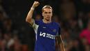 Selebrasi pemain Chelsea, Mykhailo Mudryk , setelah mencetak gol ke gawang Fulham dalam pertandingan pekan ketujuh Premier League 2023/2024 yang digelar di Craven Cottage, Selasa (3/10/2023) dini hari WIB. Gol yang dicetak pada menit ke-18 tersebut merupakan gol perdana pemain dengan julukan Neymar dari Ukraina selama berseragam Chelsea. (AFP/Adrian Dennis)